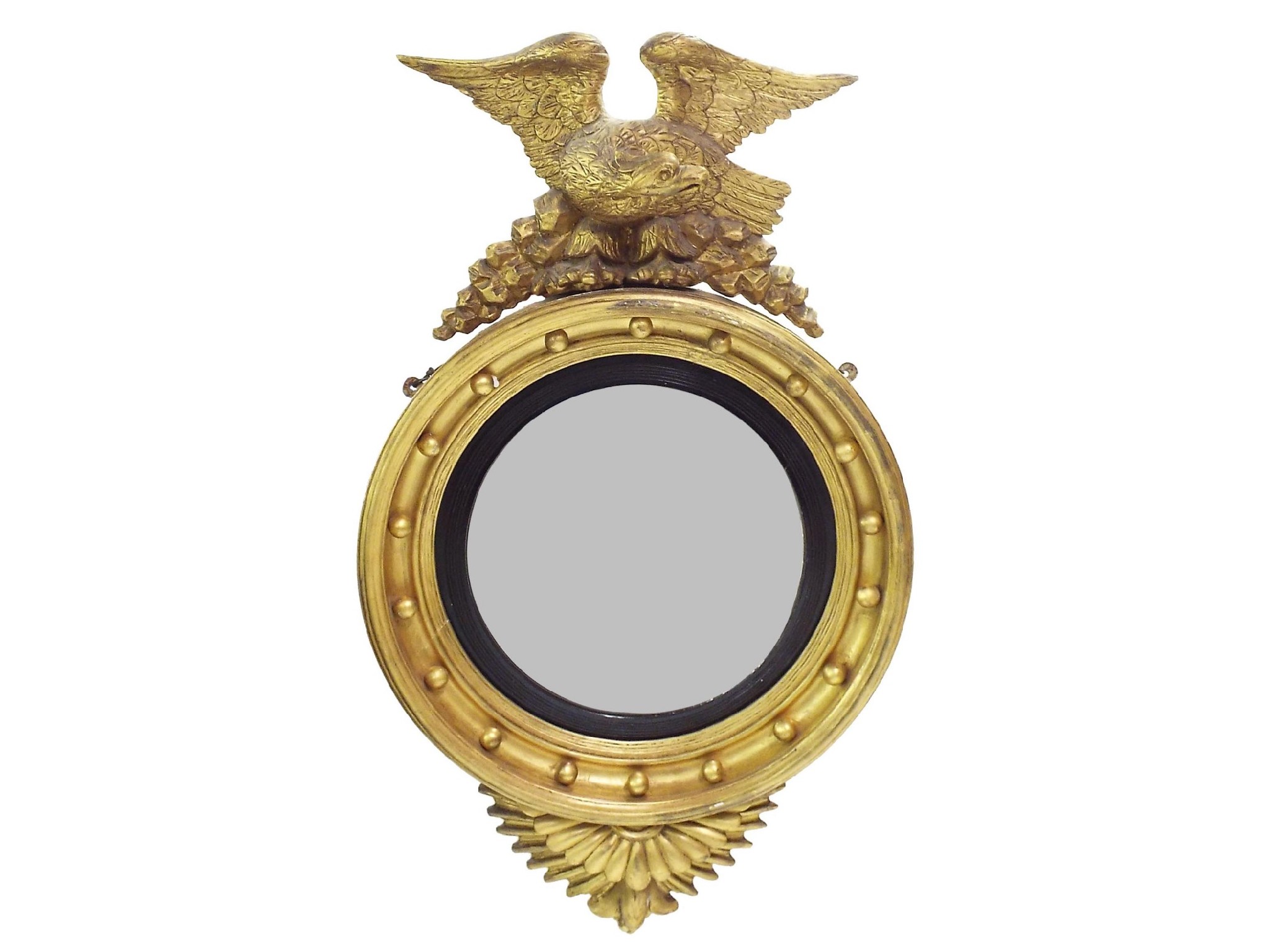 Appraisal: Regency giltwood convex wall mirror surmounted by an eagle over