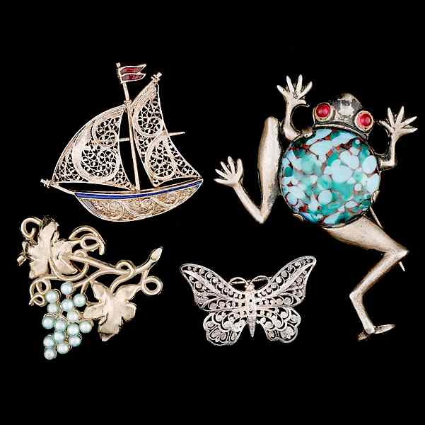 Appraisal: Grouping of German Silver and Enamel brooches A grouping of