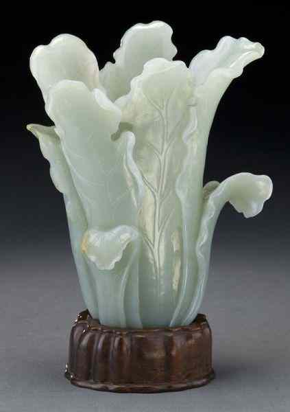 Appraisal: Chinese Qing carved jade cabbage vase Jade ''H x ''W