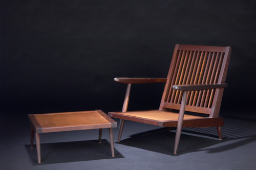 Appraisal: GEORGE NAKASHIMA Walnut Cushion Chair with arms and ottoman with