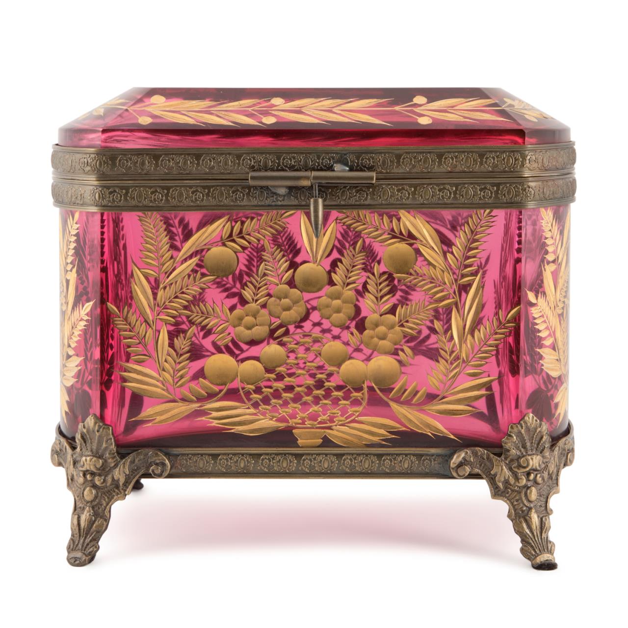 Appraisal: BRONZE MOUNTED GILDED CRANBERRY GLASS CASKET Continental bronze mounted cranberry