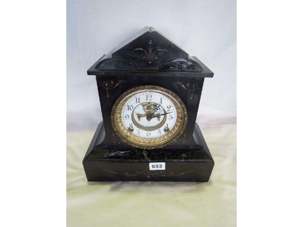 Appraisal: A late th century black slate and marble mantle clock