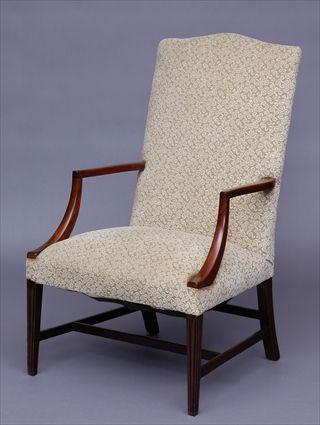 Appraisal: FEDERAL MAHOGANY LOLLING CHAIR The padded back with serpentine top