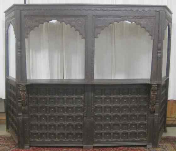 Appraisal: LARGE CARVED AND BANDED WOOD VINEYARD FRONT BAR South Asia