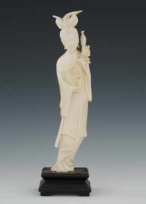 Appraisal: A Carved Ivory Quan Yin Chinese The serenely swaying figure