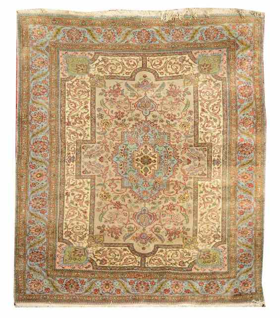 Appraisal: A MODERN PERSIAN PATTERN CARPET decorated the central panel within