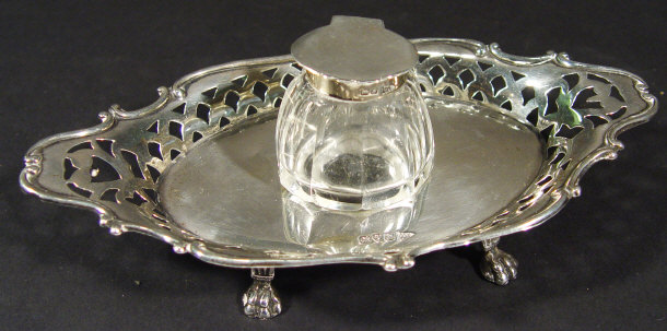 Appraisal: Cut glass silver mounted inkwell on a pierced four footed