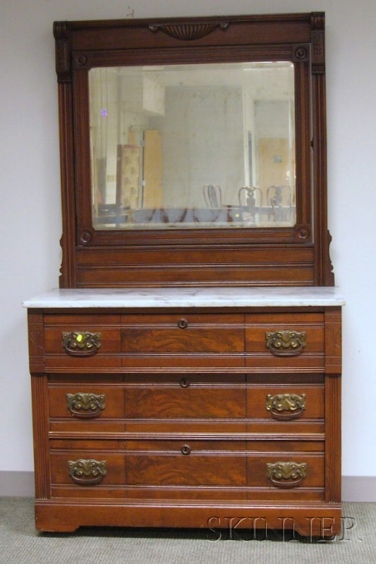 Appraisal: Victorian Eastlake-type White Marble-top Carved Walnut Mirrored Dresser