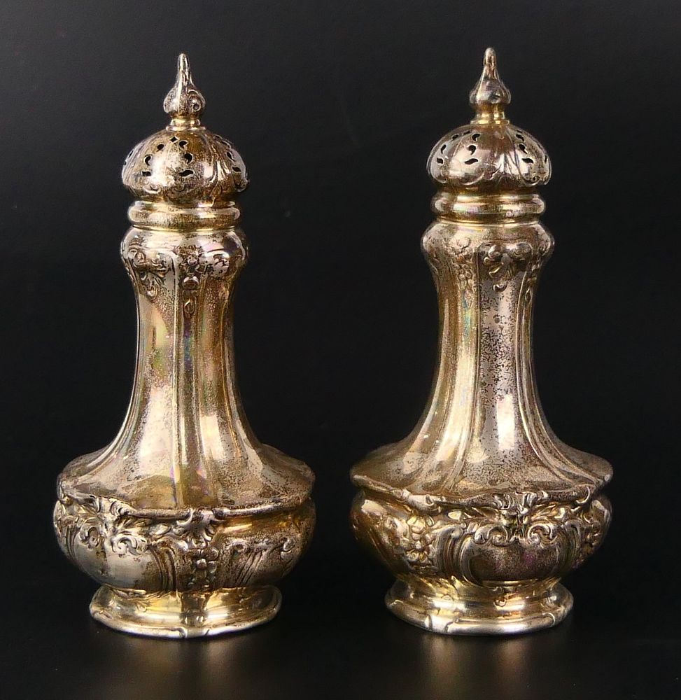 Appraisal: PAIR OF ENGLISH STERLING SILVER SHAKERS Each measures tall ozt