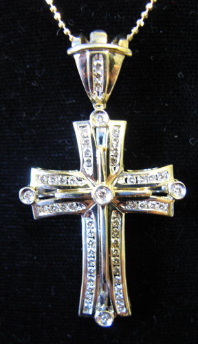 Appraisal: LARGE DIAMOND AND FOURTEEN KARAT GOLD PENDANT CROSS NECKLACE the