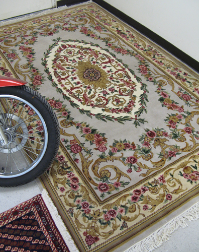 Appraisal: HAND KNOTTED ORIENTAL CARPET French Aubusson design centering a single