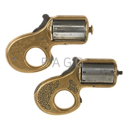 Appraisal: JAMES REID PEPPERBOXES Two caliber My Friend Knuckle Dusters with