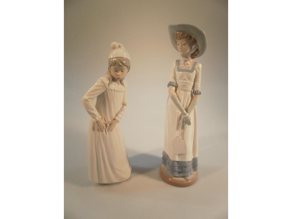 Appraisal: A Nao by Lladro large figurine of a lady another