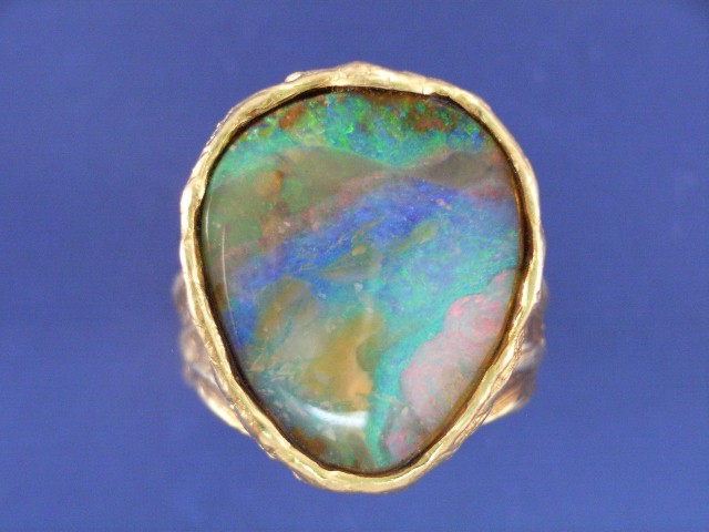 Appraisal: An ct gold boulder opal set dress ring ring size