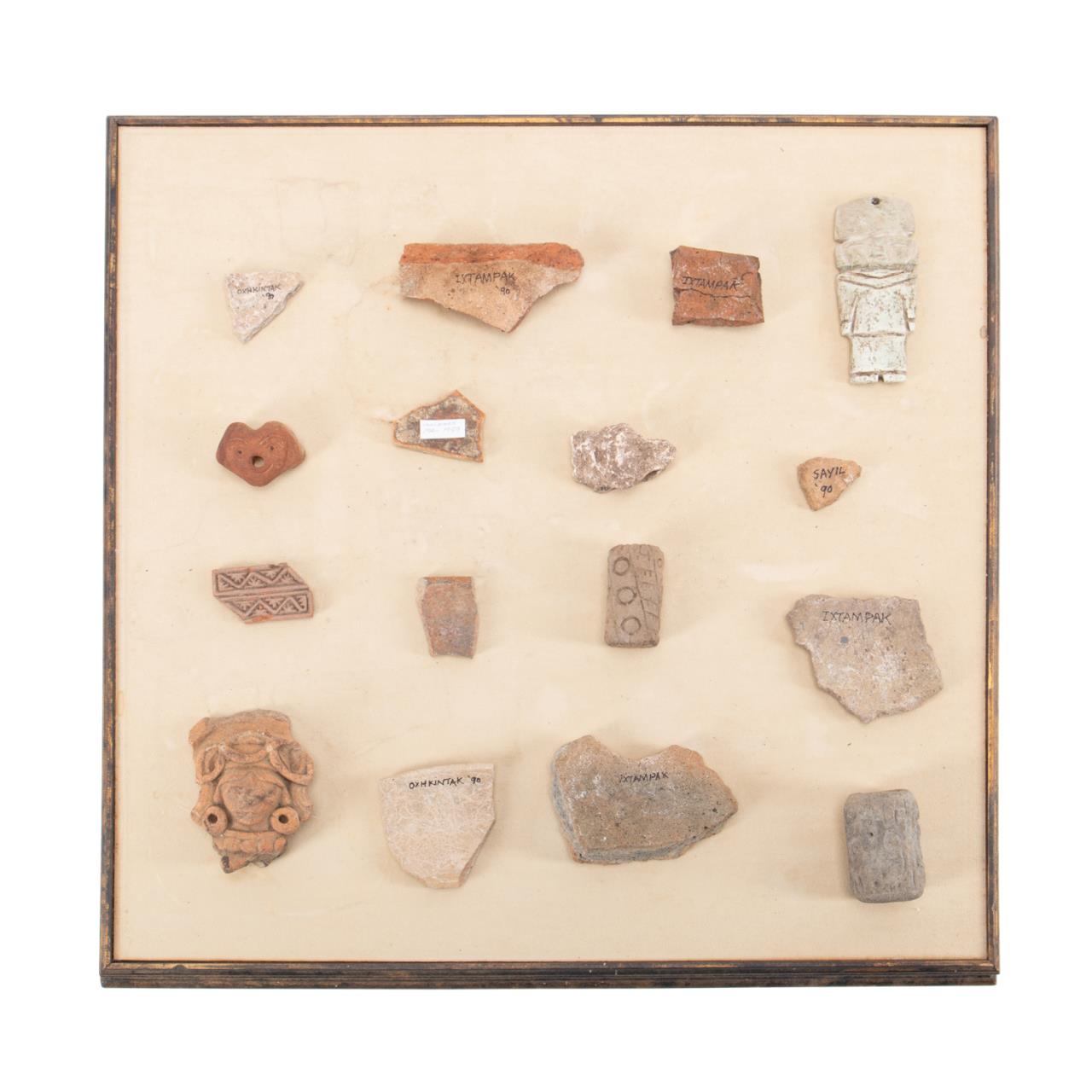 Appraisal: SHADOWBOX W SOUTH AMERICAN POTTERY FRAGMENTS Sixteen South American pottery