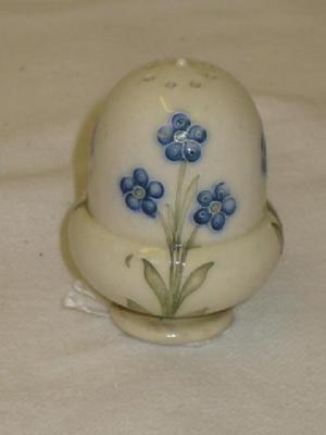 Appraisal: A MACINTYRE BURSLEM POTTERY PEPPER POT modelled as an acorn