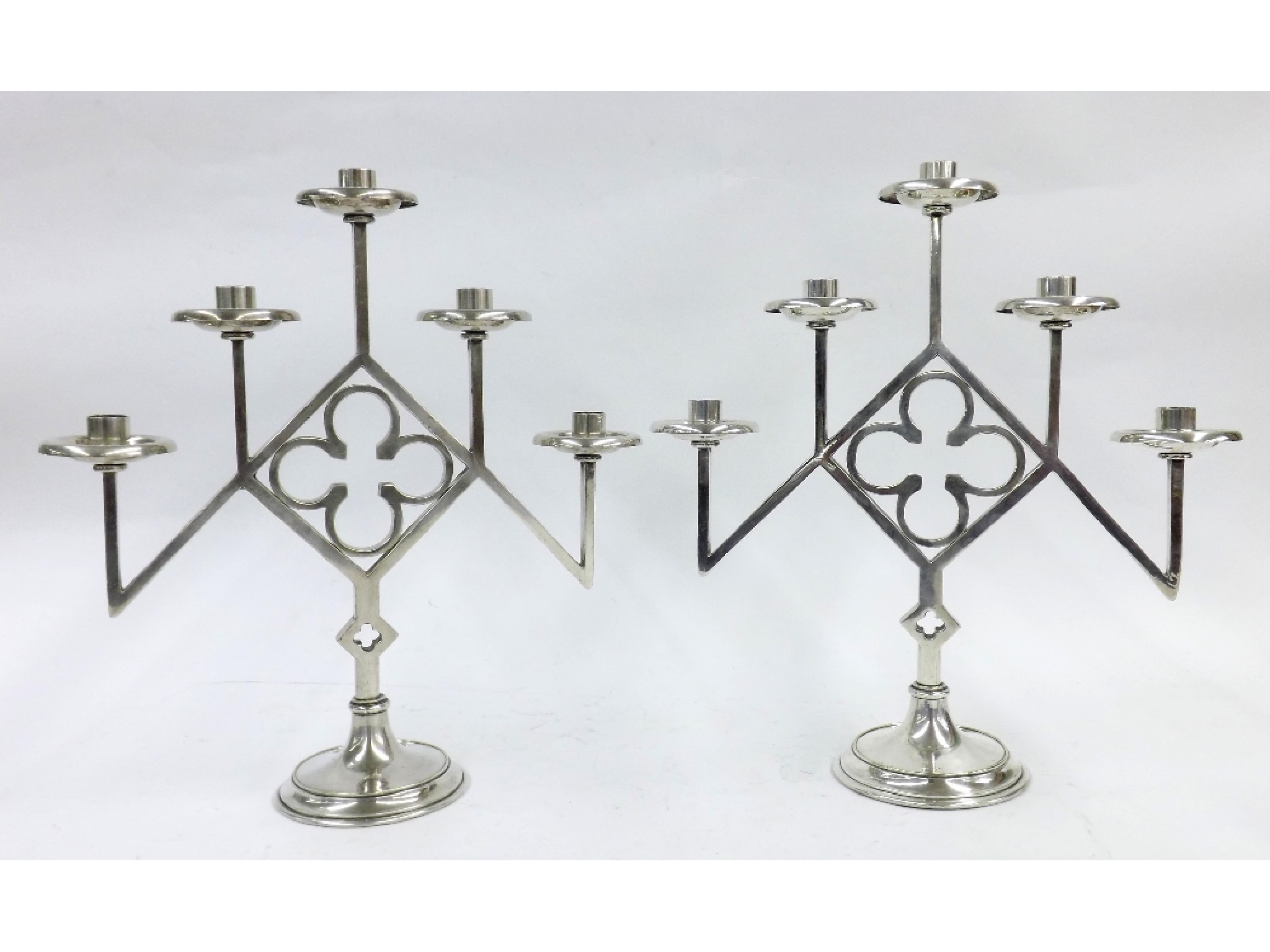 Appraisal: Pair of Arts Crafts chrome five branch candelabra centrally fitted