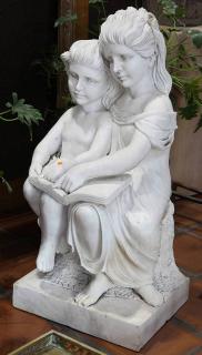 Appraisal: Carved marble sculpture depicting children reading Carved marble sculpture depicting