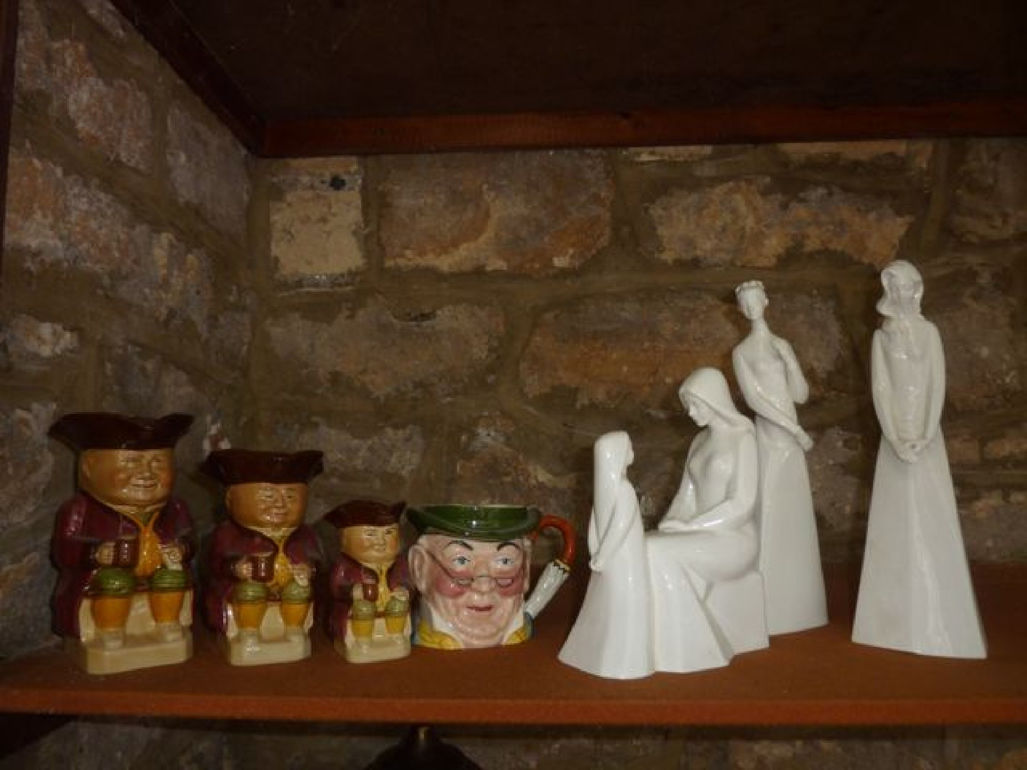 Appraisal: A collection of three Royal Doulton white glazed figures -