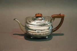 Appraisal: A George III sterling silver teapot maker WB London