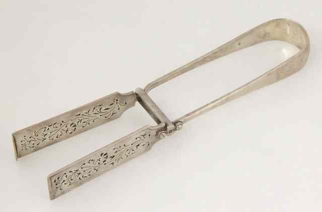 Appraisal: A pair of Victorian silver asparagus tongs Francis Higgins London