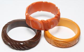 Appraisal: High Relief Vintage Bakelite Bracelets Of brown orange and golden