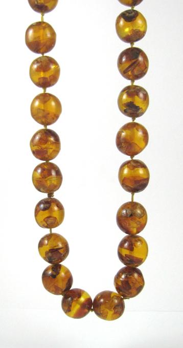 Appraisal: BALTIC PRESSED AMBER BEAD NECKLACE measuring inches in length and