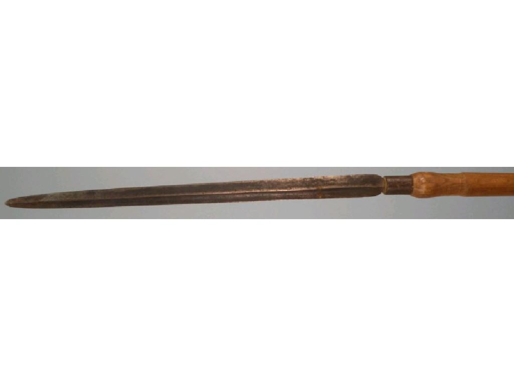 Appraisal: An African spear head with turned wood handle some worm