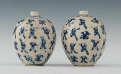 Appraisal: A Pair of Miniature Vases Bearing Kangxi Marks Ovoid shaped