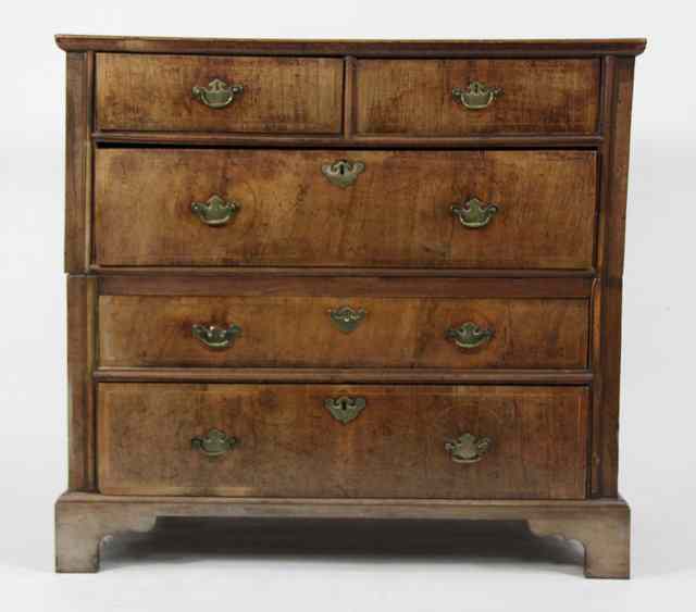 Appraisal: An th Century walnut chest of two short over three