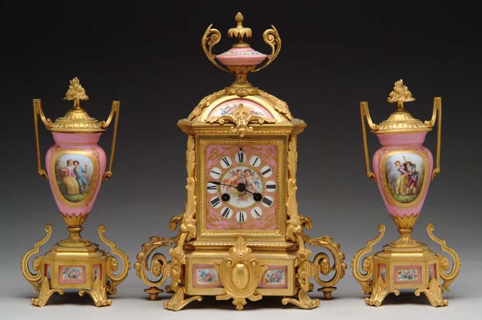 Appraisal: PORCELAIN GILT BRONZE CLOCK SUITE Wonderful gilt clock has pink