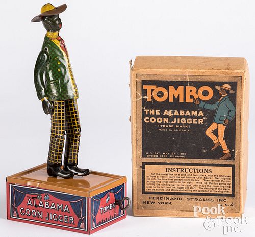 Appraisal: STRAUSS LITHOGRAPHED TIN WIND-UP TOMBO JIGGERStrauss lithographed tin wind-up Tombo