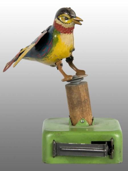 Appraisal: Tin Litho Bird Push-Activated Toy Description German Marked Made in