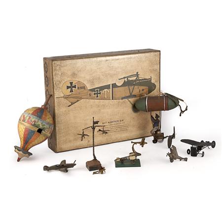 Appraisal: Group of Aviation Theme Toys Together with a Gilt Decorated