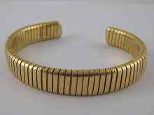 Appraisal: A yellow metal tests carat gold bangle gross wt grams