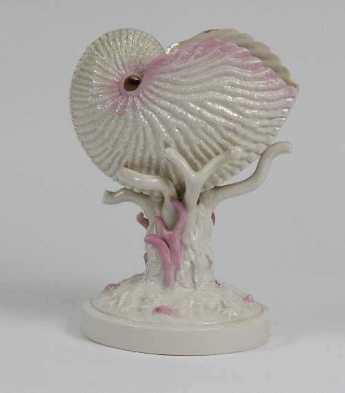 Appraisal: A Belleek shell vase coloured with pink cm high