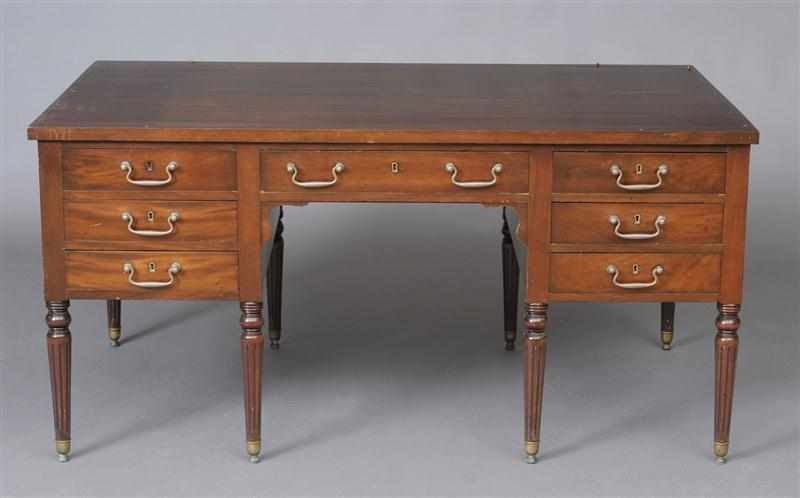 Appraisal: REGENCY STYLE MAHOGANY KNEEHOLE PARTNER'S DESK The rectangular top above