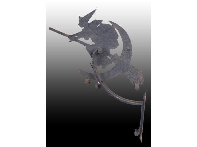 Appraisal: Metal Die-Cut Halloween Witch Flange Description Rotates on swivel hinge