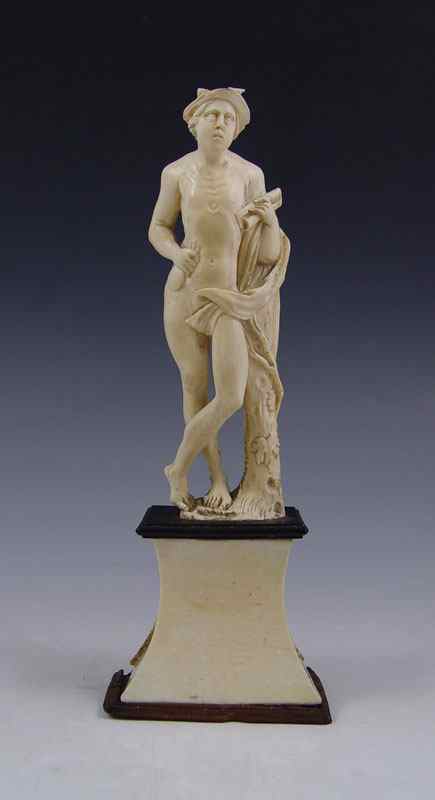 Appraisal: EUROPEAN CARVED IVORY FIGURE OF MERCURY Figure of Mercury holding