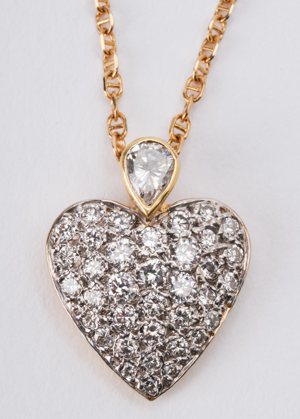 Appraisal: YELLOW GOLD DIAMOND HEART PENDANT NECKLACEcontaining one pear diamond H-I