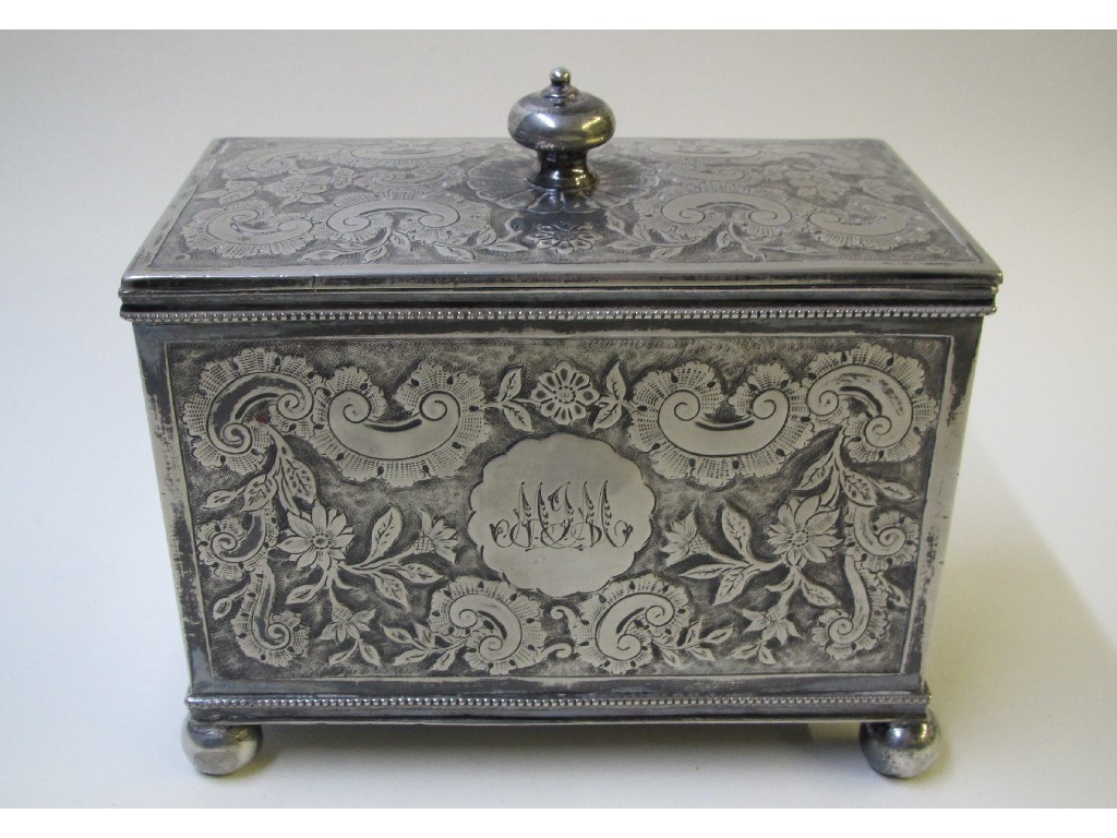 Appraisal: An electroplated tea caddy chased all over with scrolls flowers