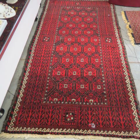 Appraisal: Bokara handmade Rug reds ivory indigio geometric florals ' x