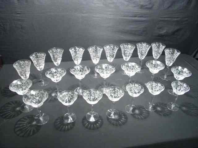 Appraisal: Etched glass stemware set Floral etched pattern Unmarked Includes ten