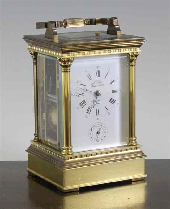 Appraisal: A French ormolu hour repeating carriage alarum clock with enamelled