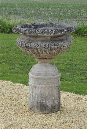 Appraisal: PORTLAND STONE URN The bowl on socle and cylinder pedestal