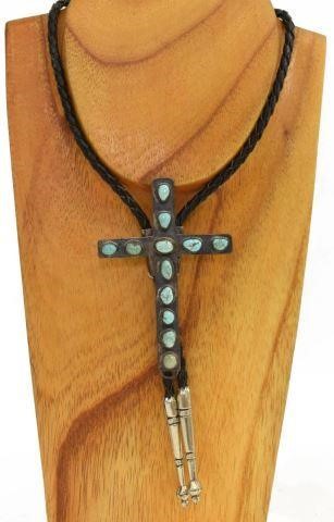 Appraisal: Native American silver content unknown bolo tie cross bolo ornament