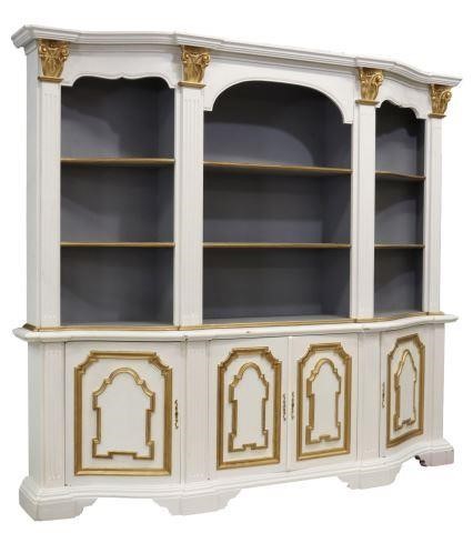 Appraisal: Italian parcel gilt and painted stepback bookcase th c molded