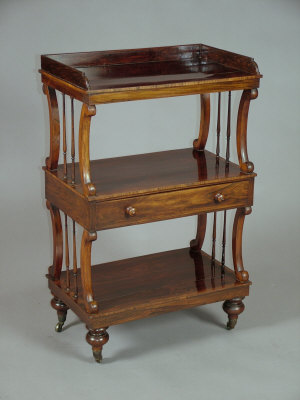 Appraisal: A Regency rosewood three tier whatnot the top with three