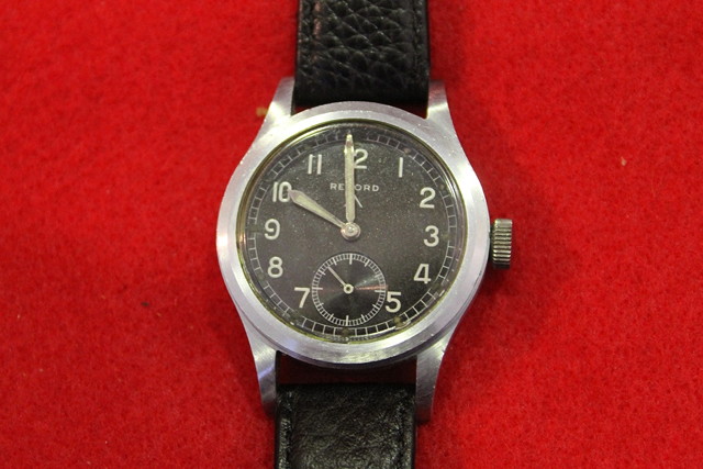 Appraisal: A RECORD STAINLESS STEEL GENTLEMANS MILITARY WRIST WATCH with leather