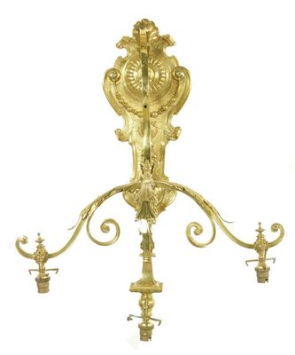 Appraisal: A large gilt brass three branch wall light the shaped